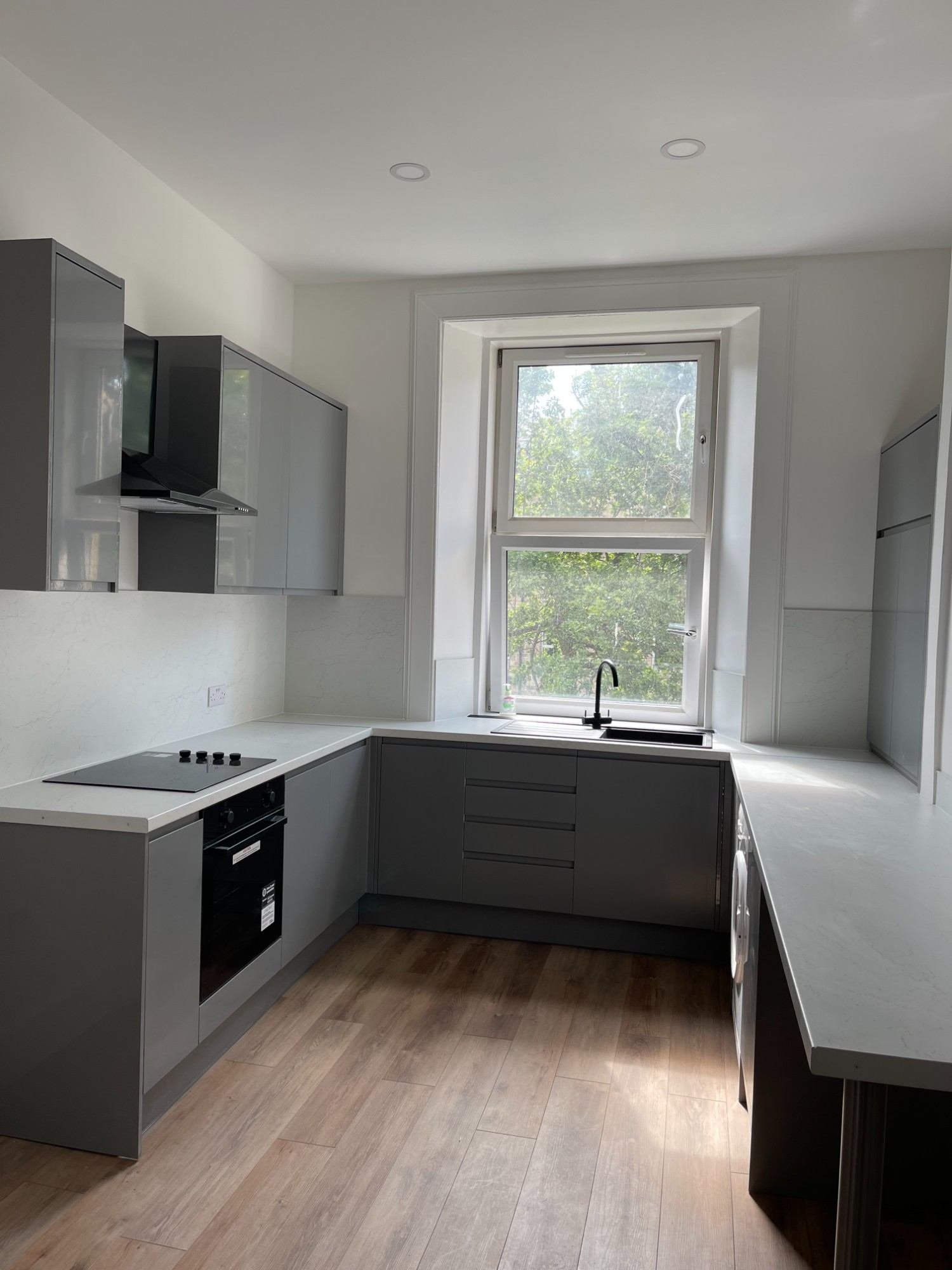 Finished renovated kitchen with new units, LVT flooring and smooth ceiling, Marchmont flat, Edinburgh