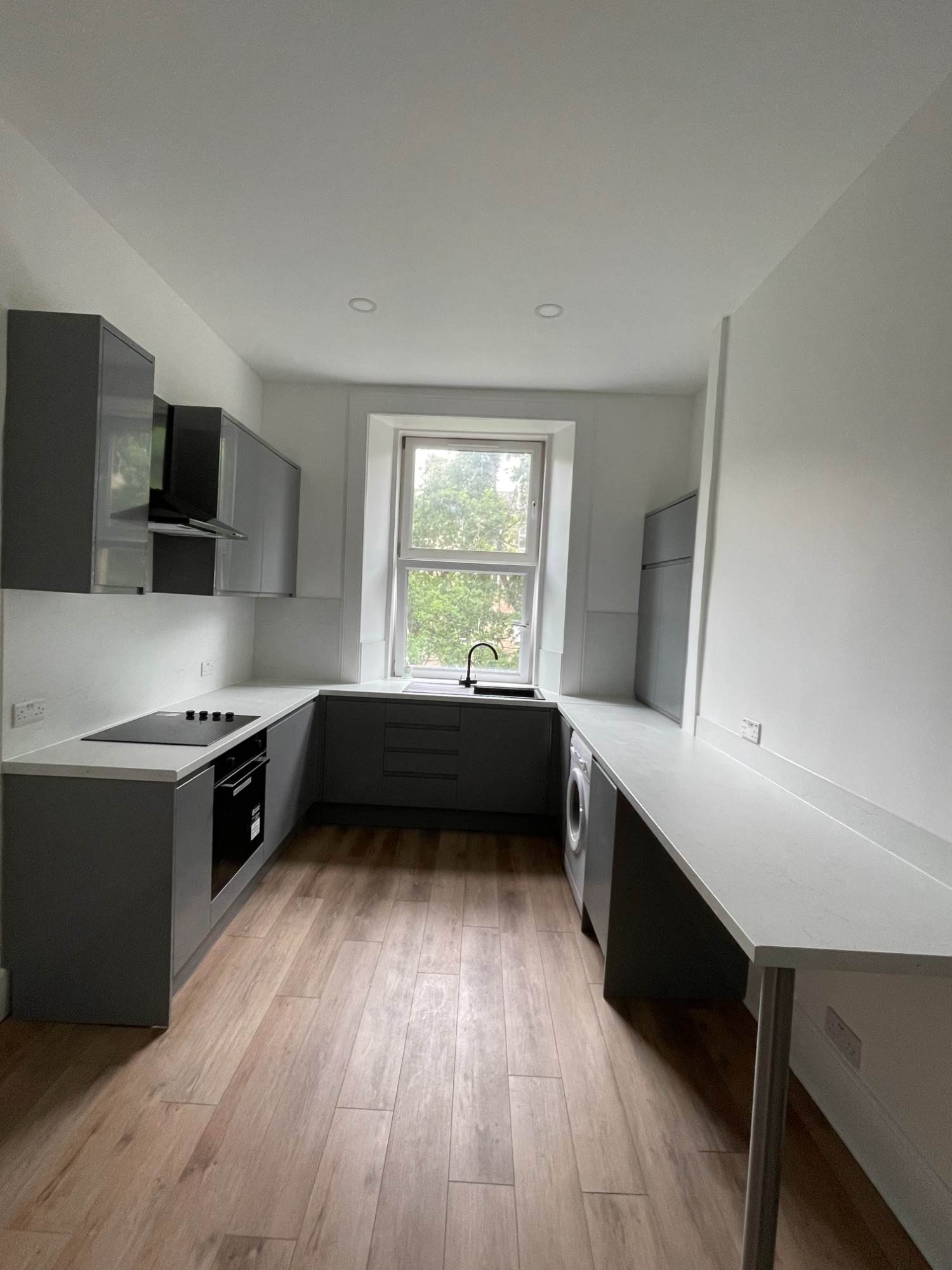 New plasterboard kitchen ceiling fixed to a timber frame before finishing, Edinburgh
